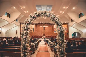 bride and groom inside the church with wedding setup