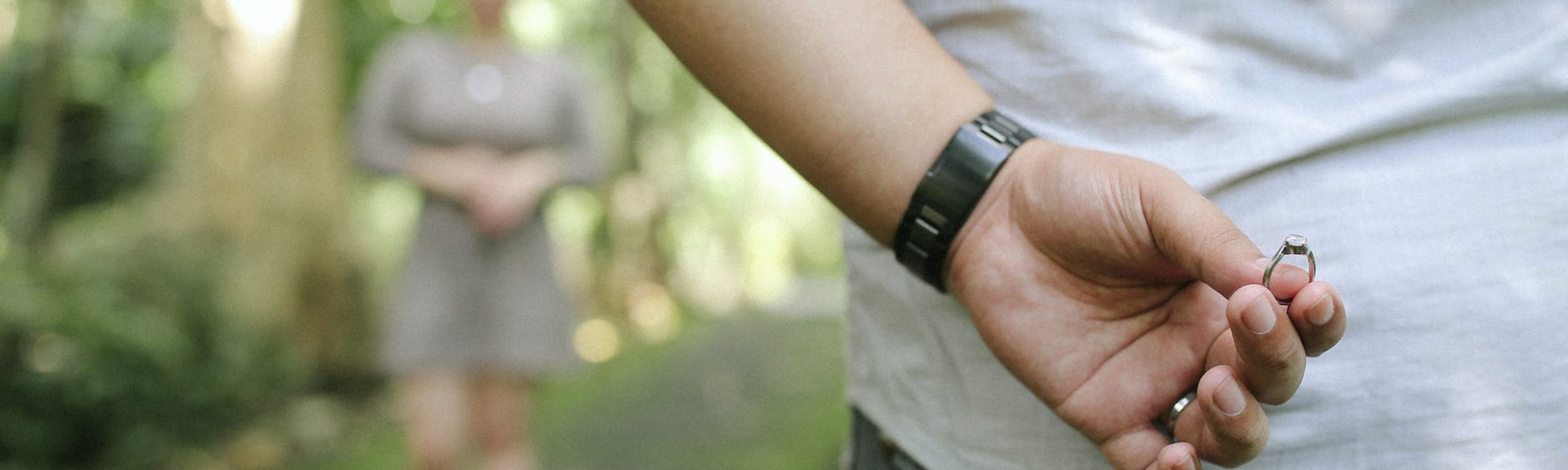 close up photo of person holding ring