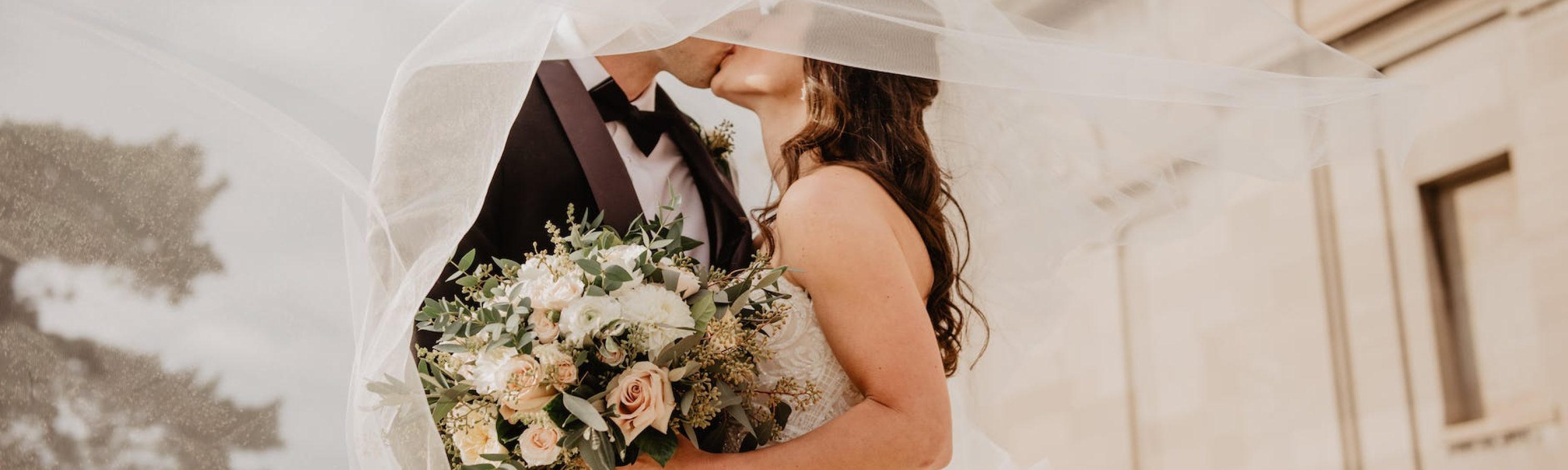 man and woman kissing